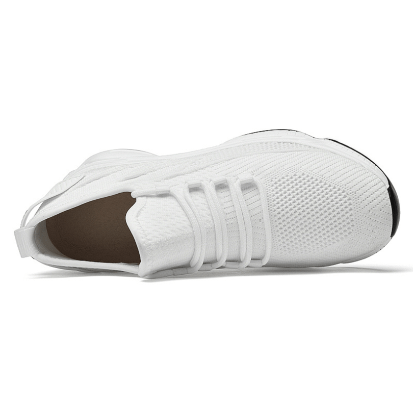 Profil latéral d’une chaussure rehaussante blanche pour homme et femme